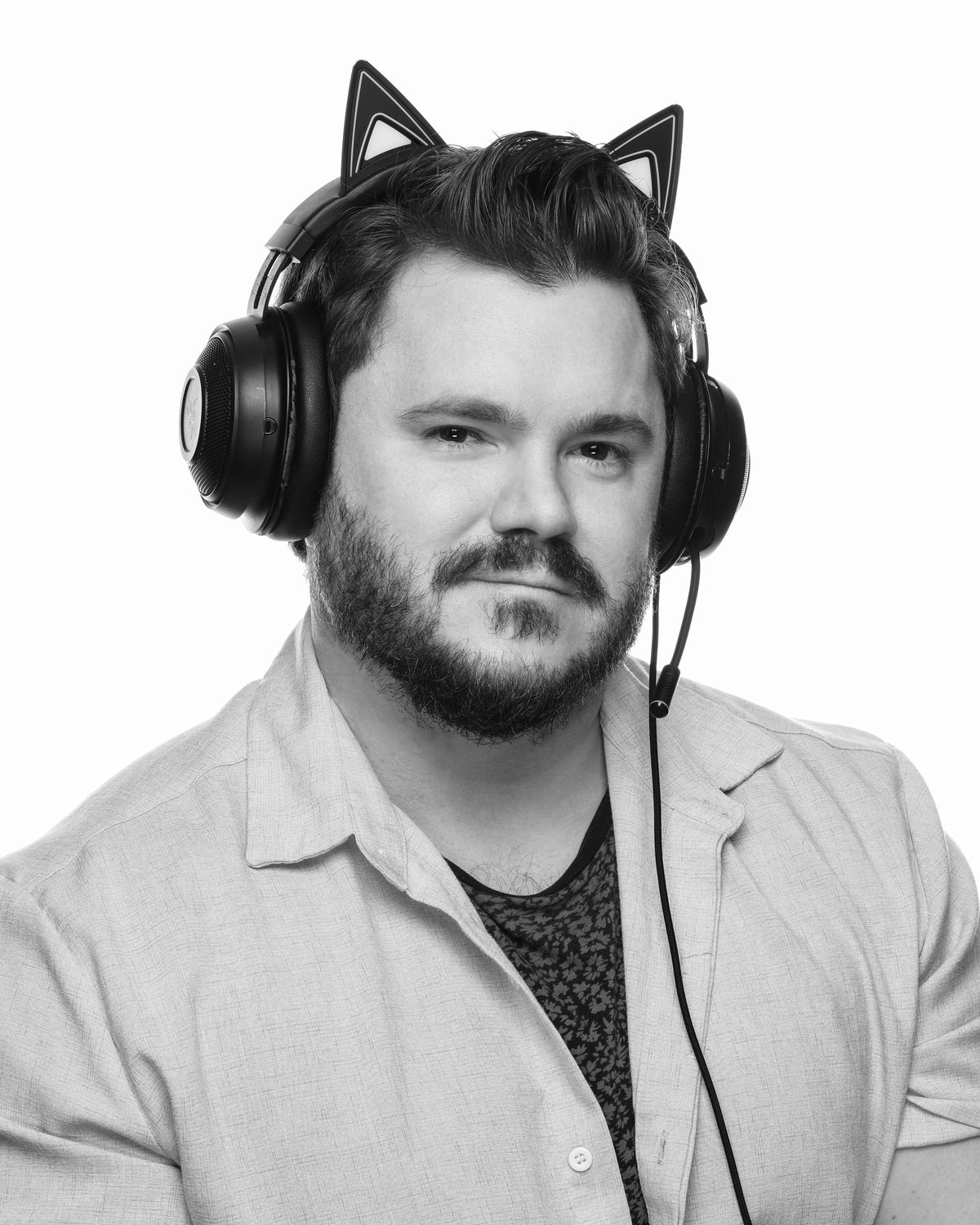 Brian Ecclefield, CEO and Founder of Validated Claim Support, wearing headphones